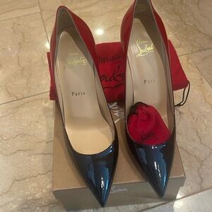 Woman Christian Louboutin heels, 100 shoes